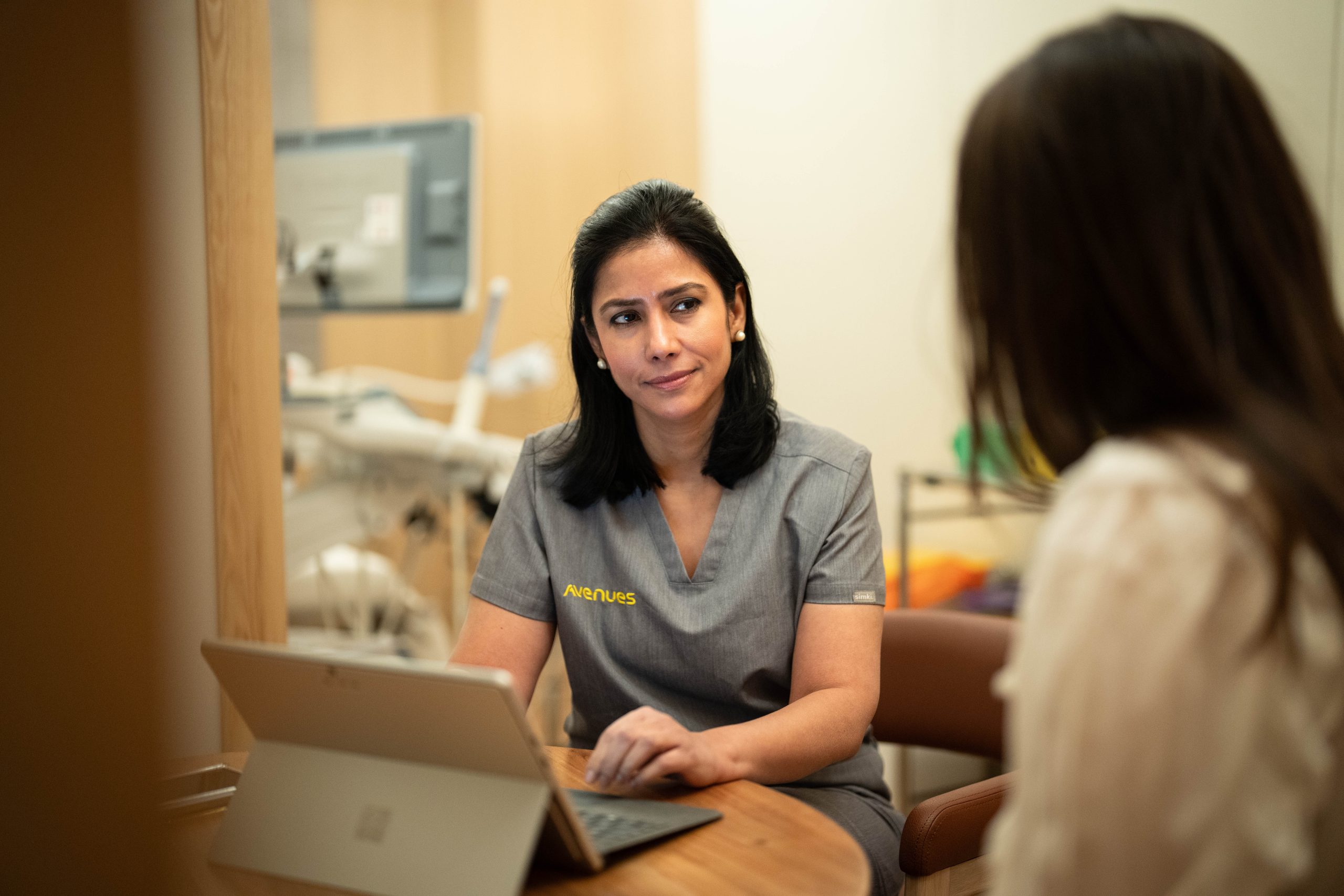 Dr Jyoti aneja consulting with a fertility patient at Avenues in Camden, London, UK